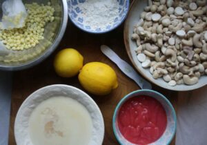 All of the ingredients needed to make a vegan white chocolate cheesecake