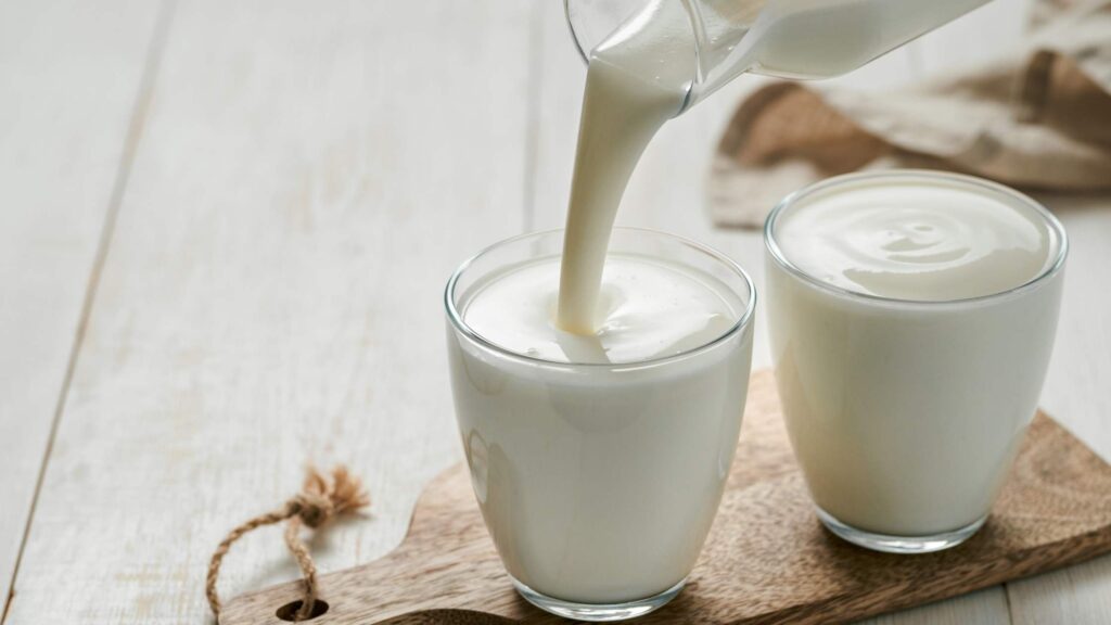 A glass of vegan buttermilk which makes a great vegan egg substitute