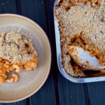 A spoonful of vegan butternut squash mac and cheese on a plate