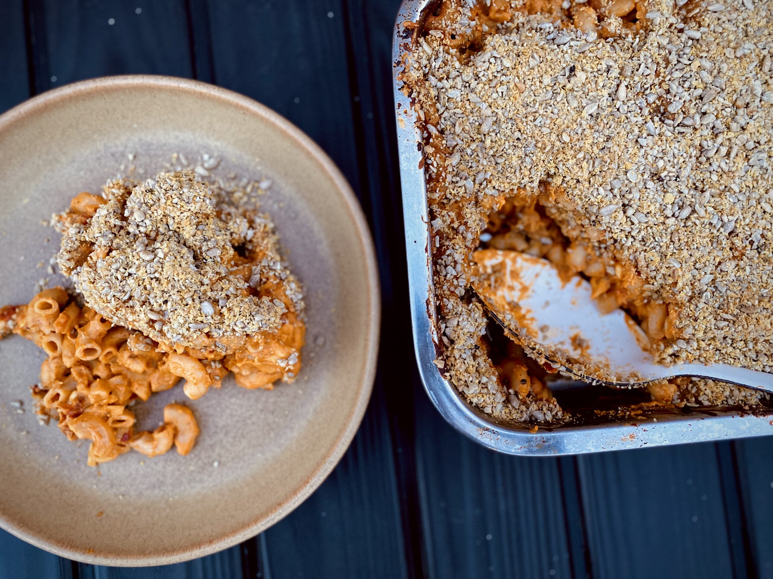 A spoonful of vegan butternut squash mac and cheese on a plate