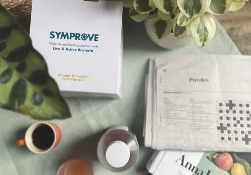 An aerial view of Symprove supplement amongst elements of my daily routine, photographed for this Symprove review