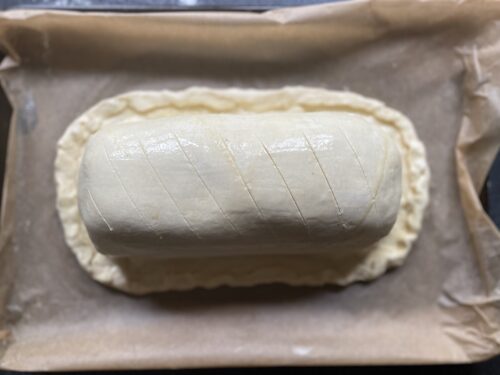Vegan beef wellington scored and ready to go in the oven