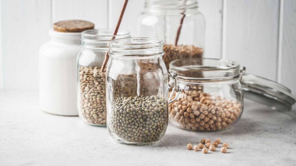 Jars of legumes that are all vegan