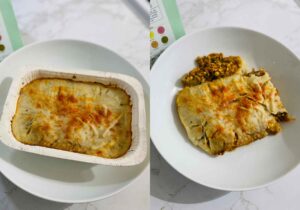 A cooked Field Doctor plant-based lasagne meal in the tray on the left and on the plate on the right
