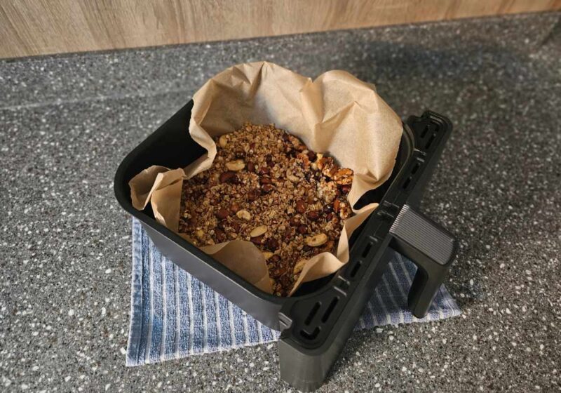 Some crispy air fried granola cooling down inside the cosori tray